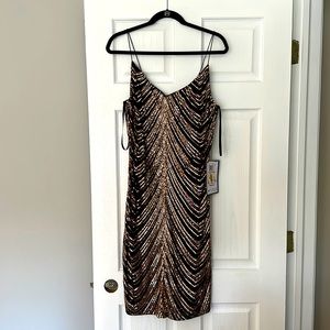 Black and gold sequins dress, new with tags.
